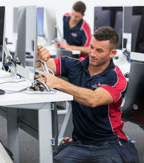 Elam Cabling technician helping relocate data and power cabling