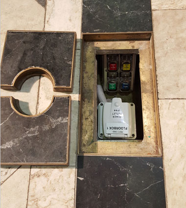 Heritage building cabling to floor-box for power and data in Great Hall Sydney University